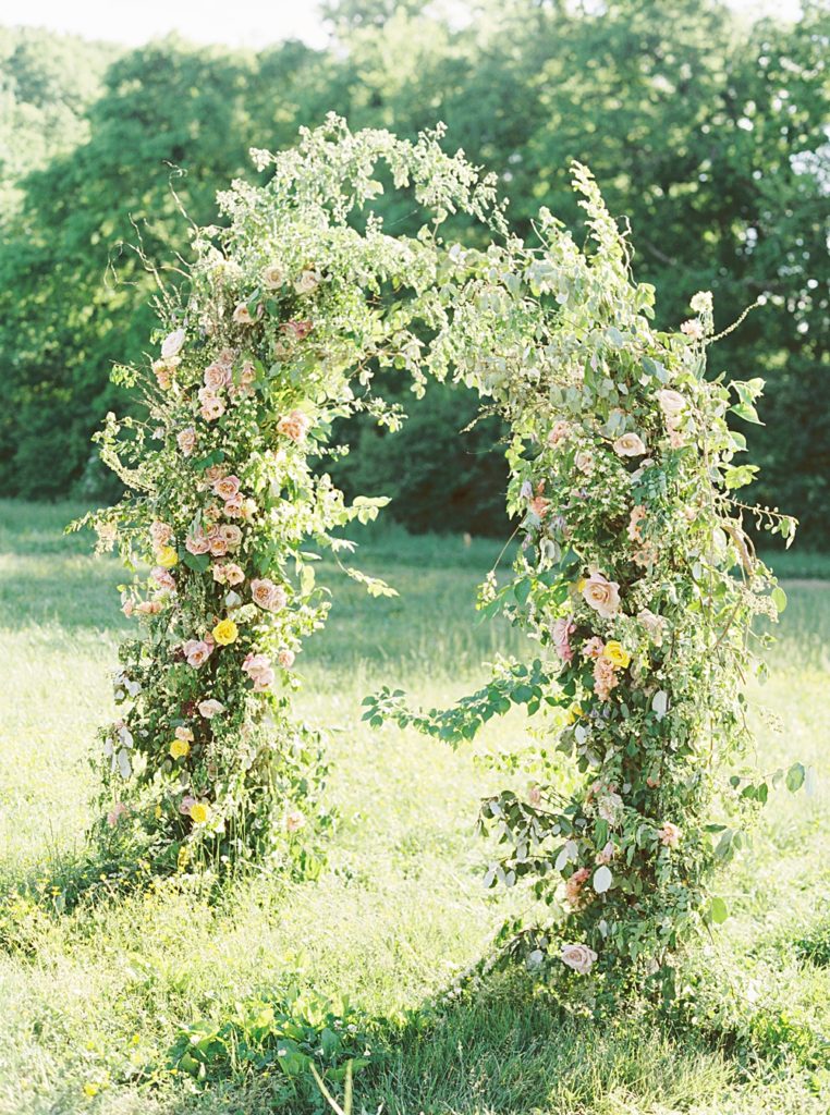 unfinished wedding ceremony floral arbor | Nashville Wedding Photographer | Shauna Veasey Photography | Nashville Film Photographer