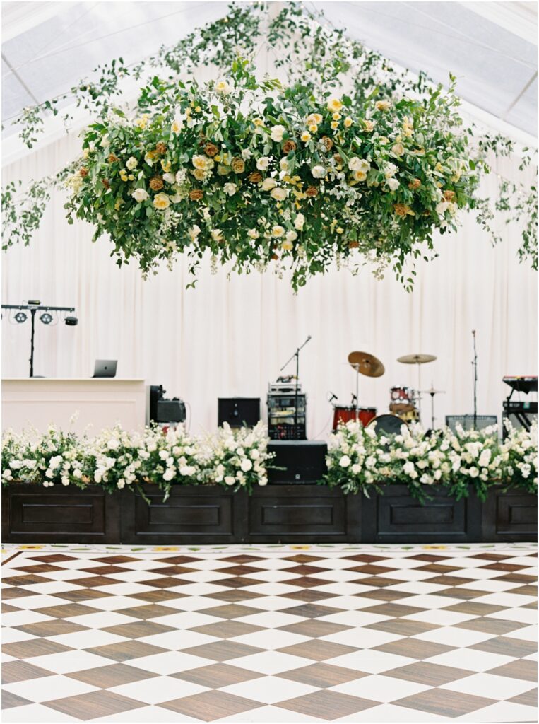 Italian-inspired reception design at Crane Cottage featuring Tuscan tile patterned dance floor.
