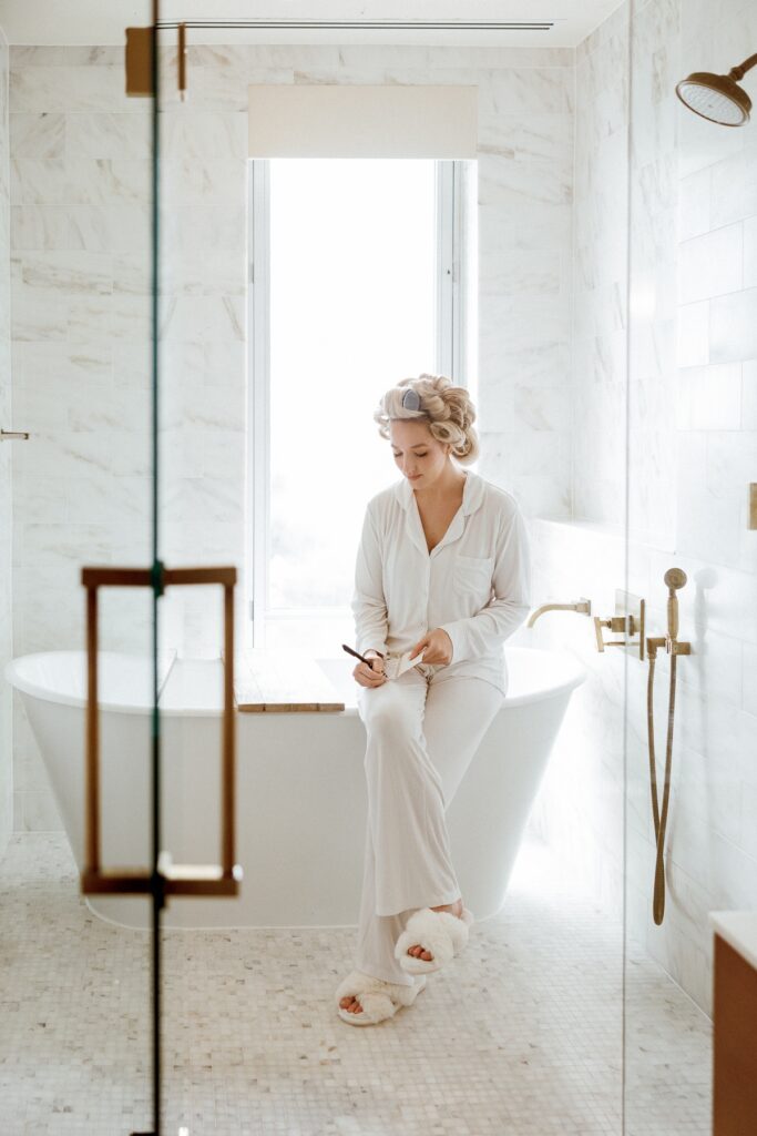 getting ready for a black tie wedding at The Dewberry in Charleston