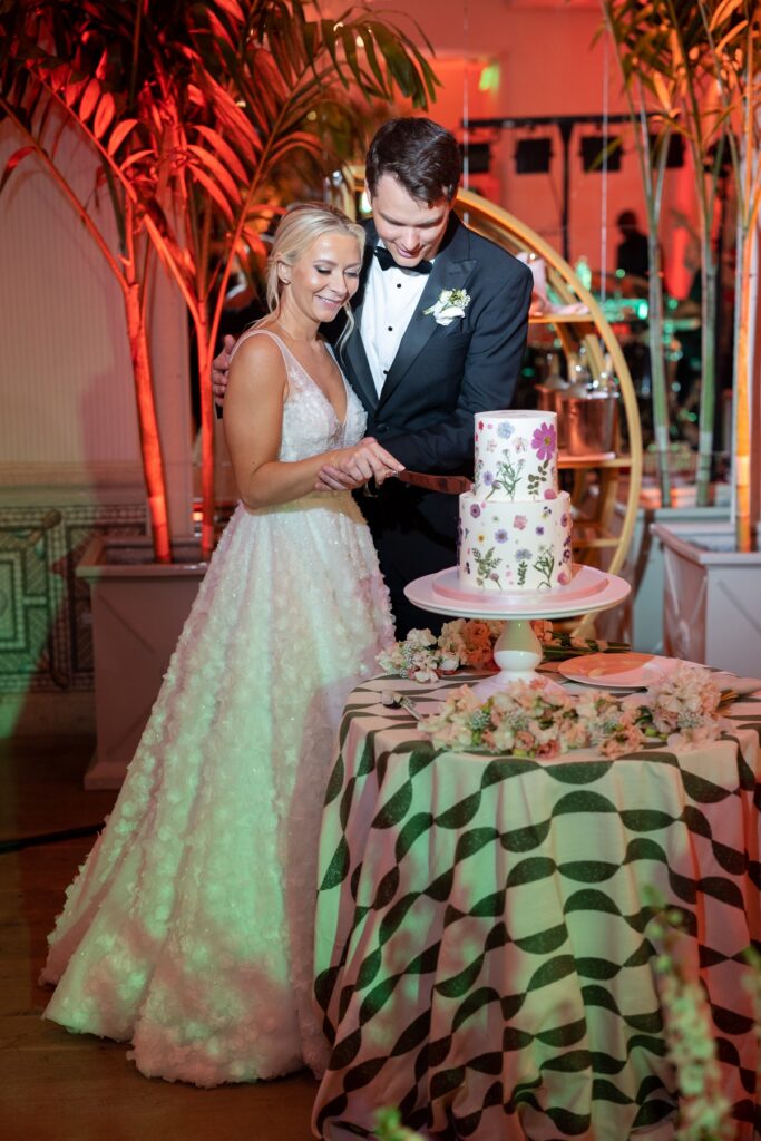 Elegant Palm Beach wedding cake display with floral details
