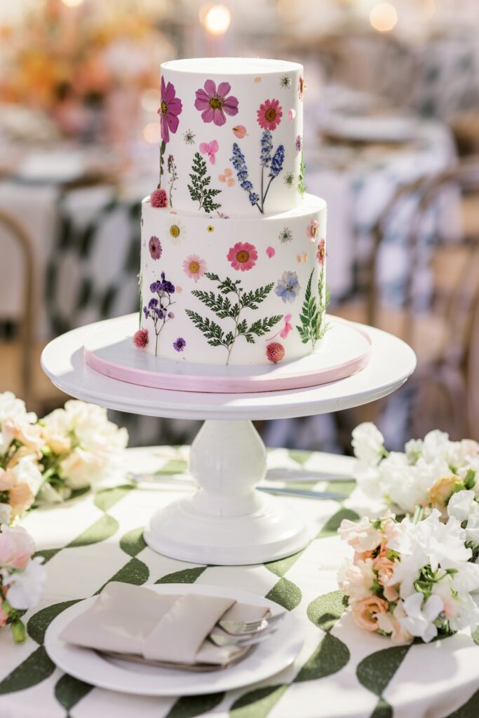 Elegant Palm Beach wedding cake display with floral details