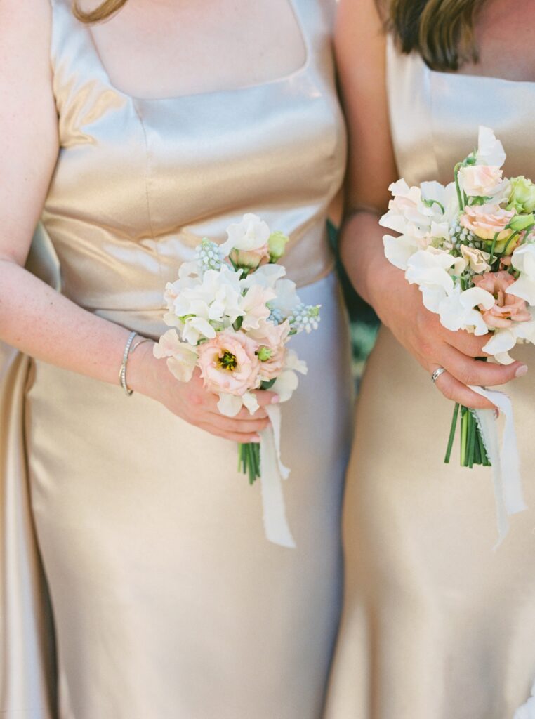 petite bridesmaids bouquets and champagne dresses at The Colony Hotel