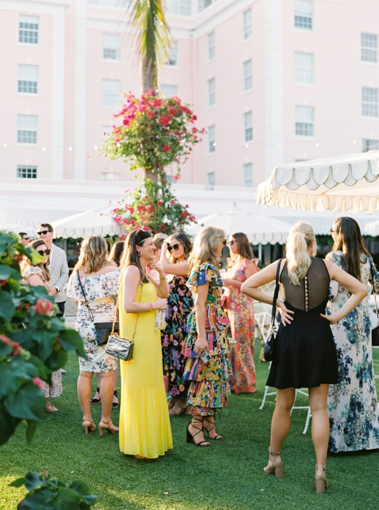 guests mingling at The Colony Hotel during cocktail hour