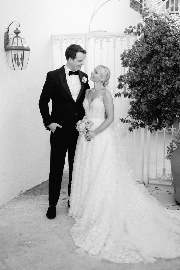 bride and groom in the courtyard at The Colony Hotel