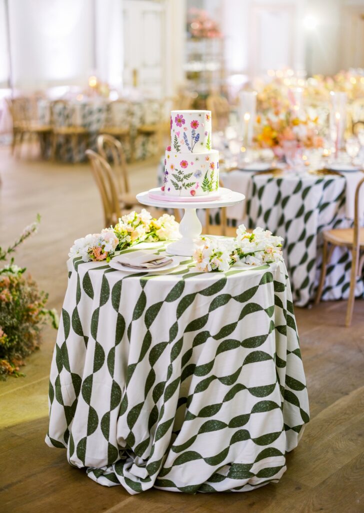 Elegant Palm Beach wedding cake display with floral details