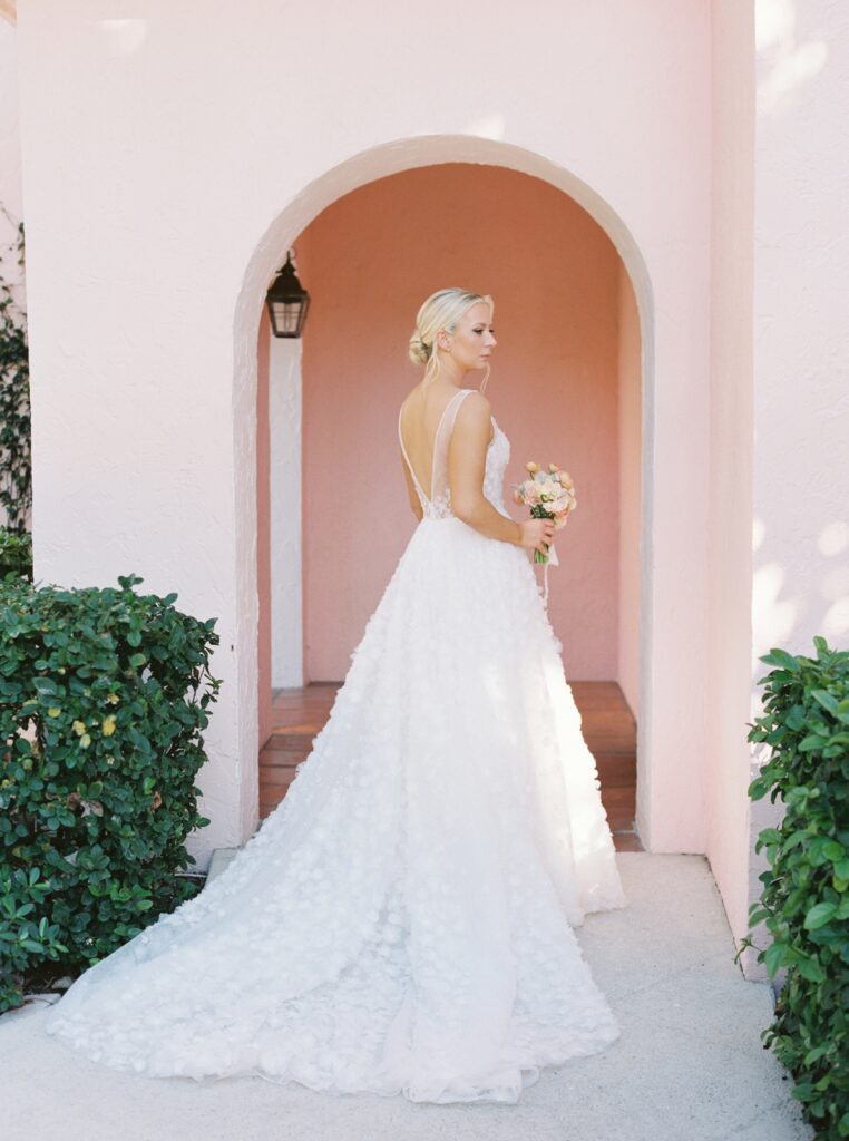 Bride portrait at The Colony Hotel Palm Beach pink archway